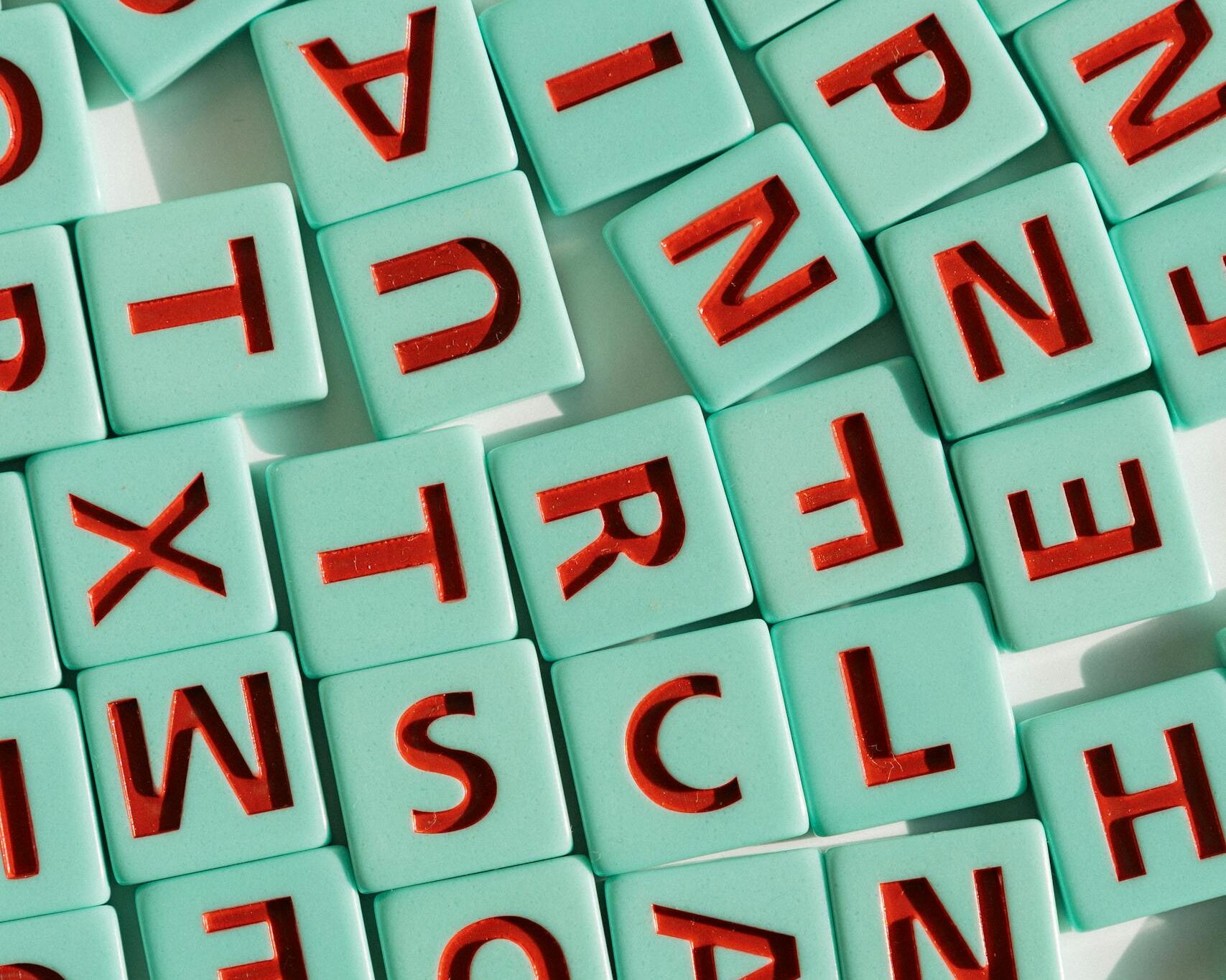 An arrangement of colorful letter tiles, perfect for educational and playful themes.